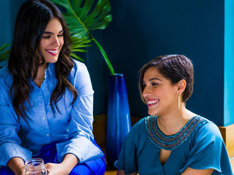 Two woman's sitting