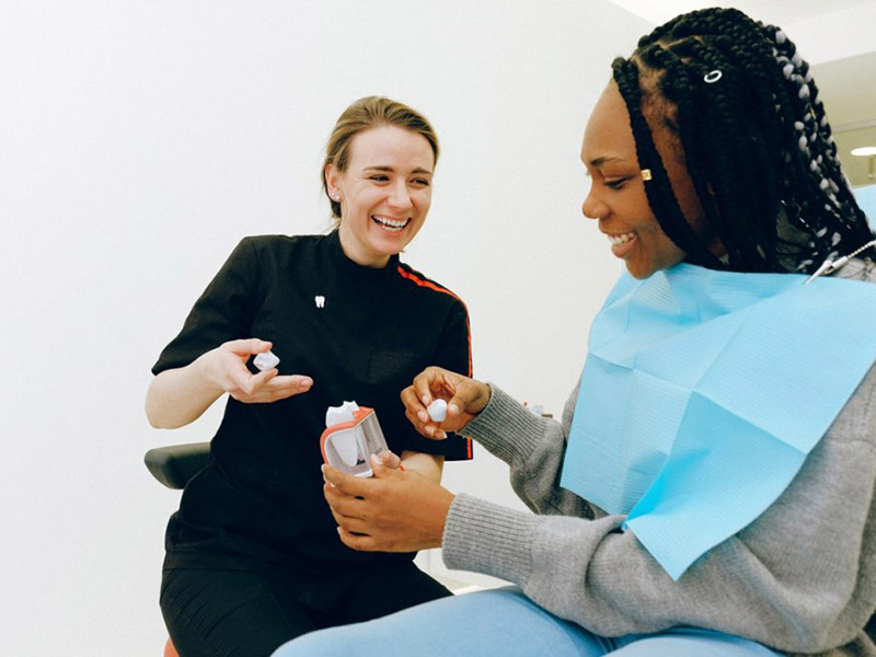 Woman asking about cosmetic dentistry