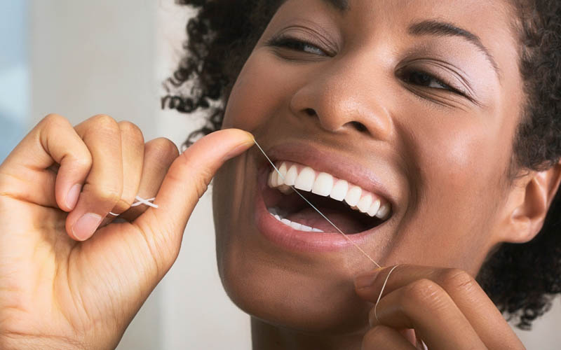 Pretty woman's teeth cleaning