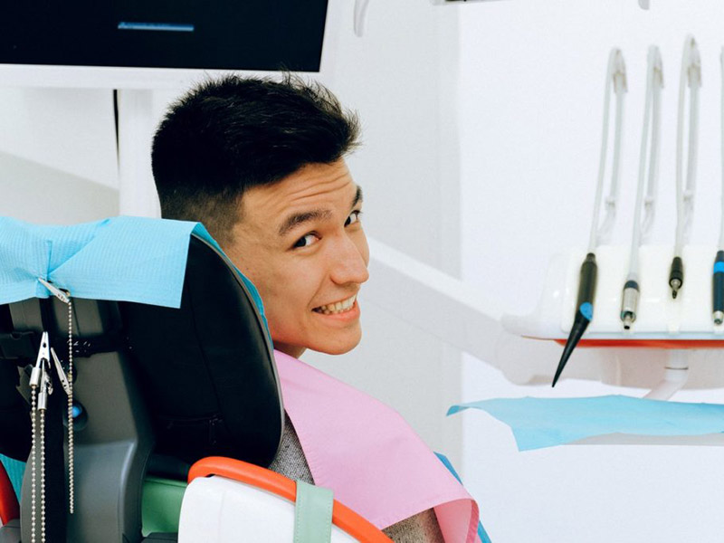 Young man at dental office.