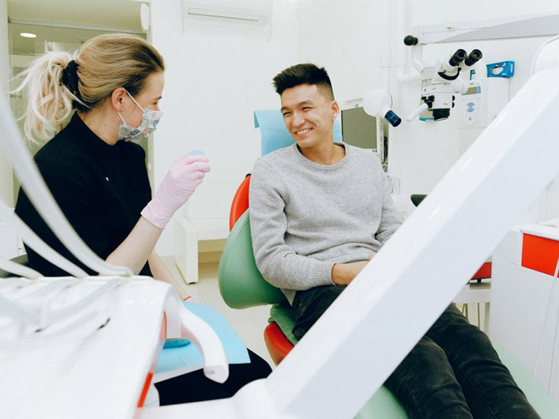Younger man at dentist; wisdom teeth