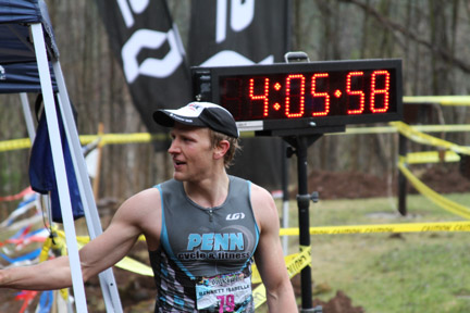 young man finishing his running
