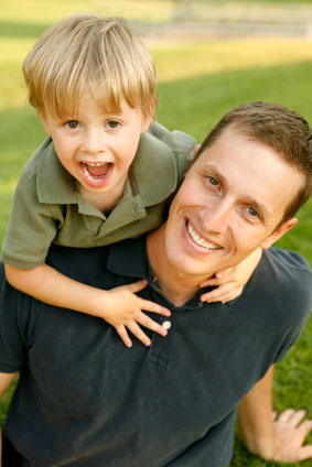 father and his child playing