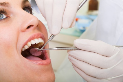 a women getting tooth treatment