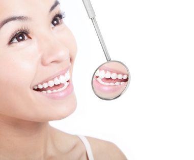 Woman showing her teeth to dentist