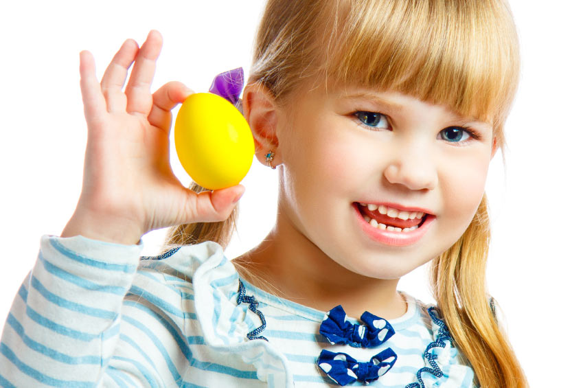 small girl holding lemon