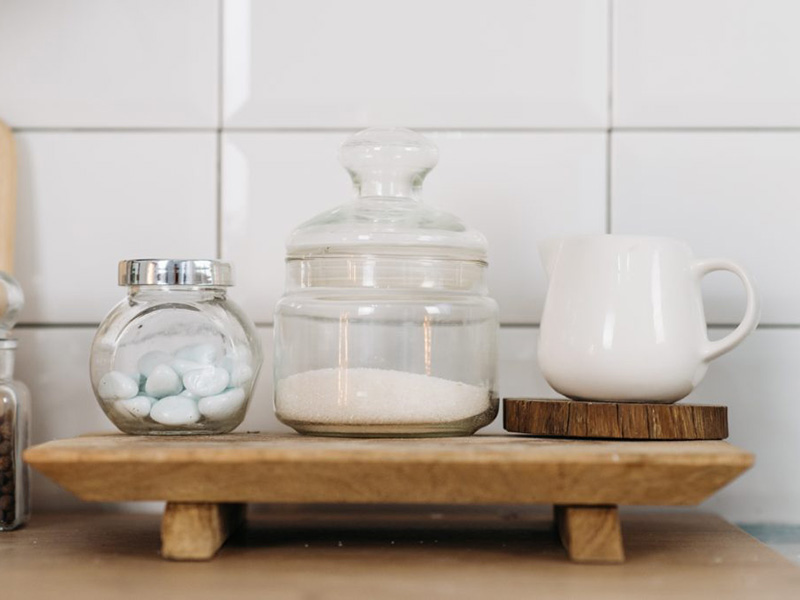 Bowl of sugar on a kitchen counter