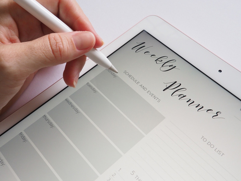 Person working on tab