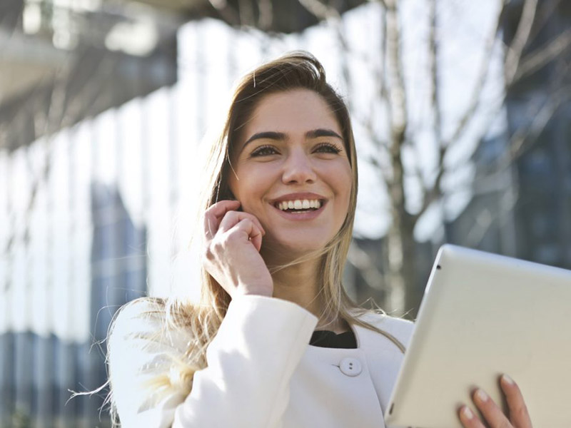 Women with healthy smile. Learn how dental sedation can help you conquer dental fears.